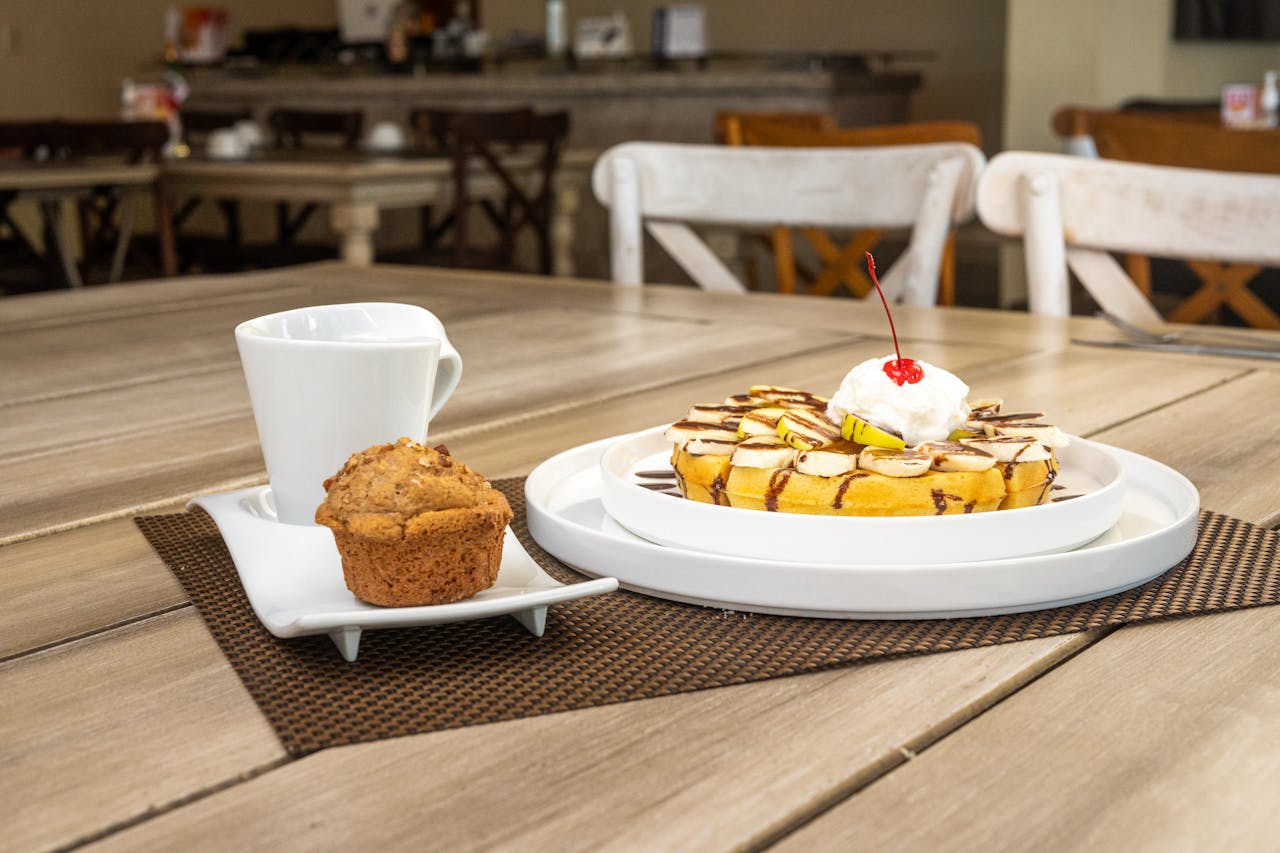 Start your day with coffee, muffin, and a sweet waffle breakfast in a Salamanca cafe.